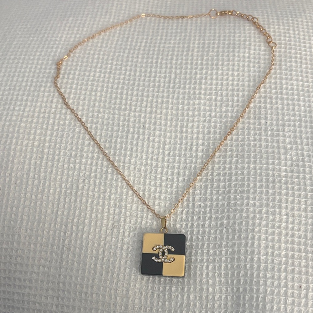 Two-Tone Square Pendant Necklace with Crystal Logo Accent - Gold and Black